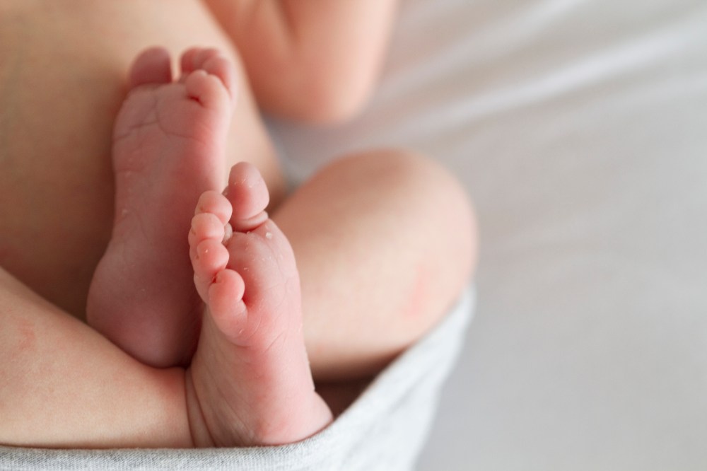close up photo of newborn baby feet.